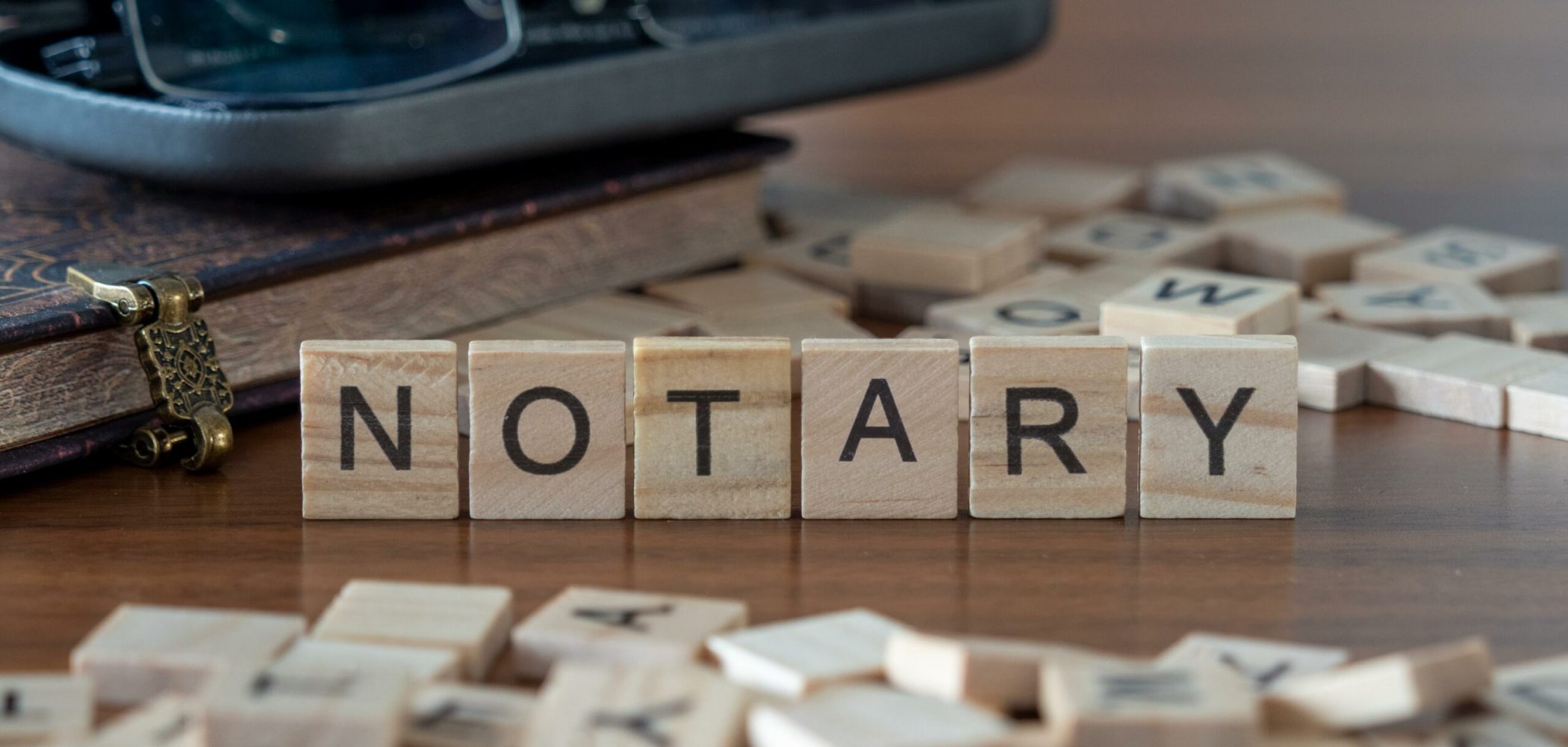 notary the word or concept represented by wooden letter tiles